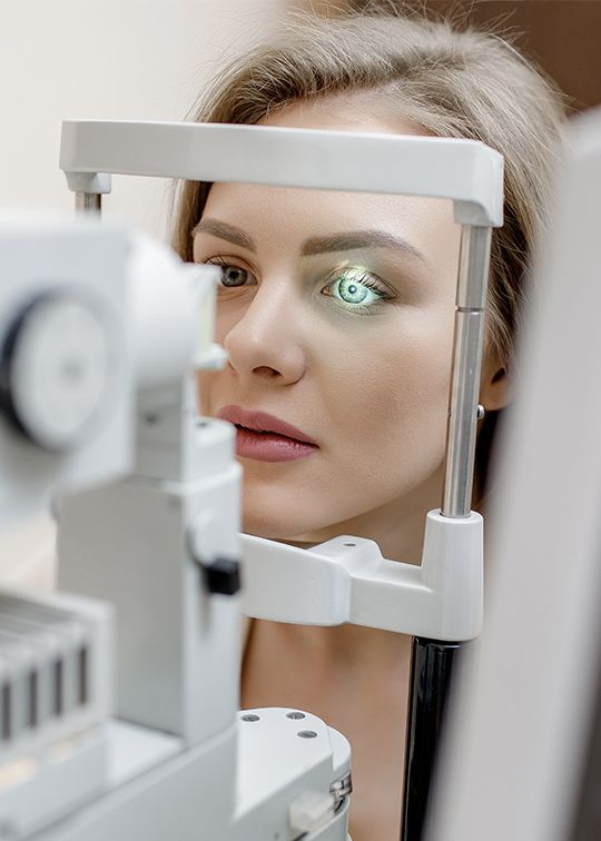 Woman getting an eye exam